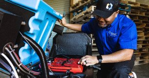 DOC technician working on equipment