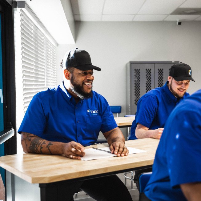 technicians learning at the training center