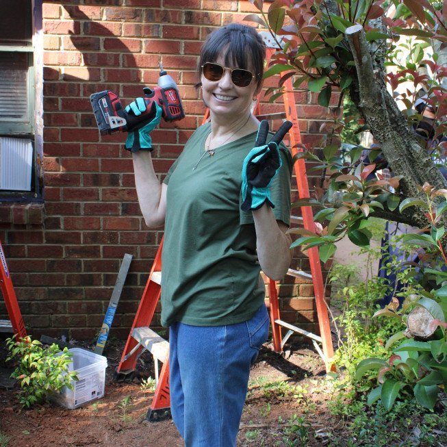 volunteer working on Habitat for Humanity house