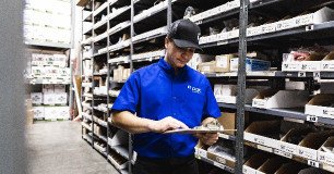 technician evaluating inventory