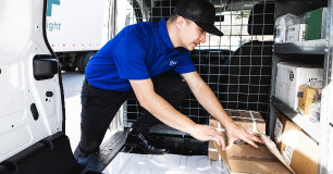 technician packing truck with equipment for delivery