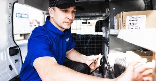 technician preparing truck for overnight delivery