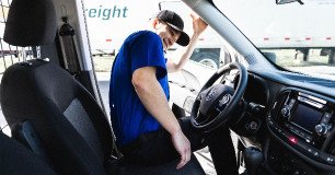 technician entering his vehicle