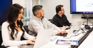 group of analysts reviewing data