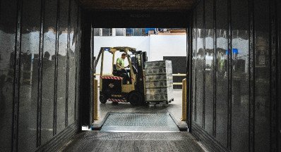 DOC services employee operating forklift